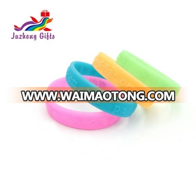 High quality low price color embossed print Buddhist custom logo silicone bracelet wristband